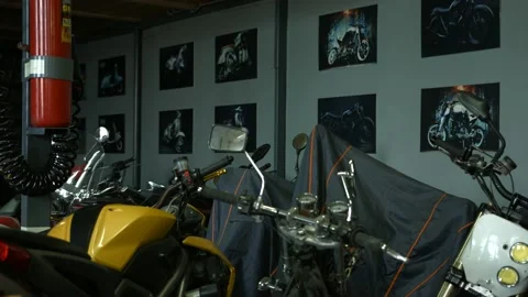 Motorcycles stand in the workshop Stock Footage 147554349