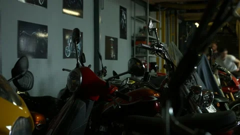 Motorcycles stand in the workshop Stock Footage 147554358