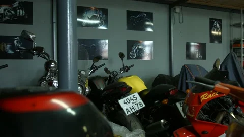 Motorcycles stand in the workshop Stock Footage 147554367