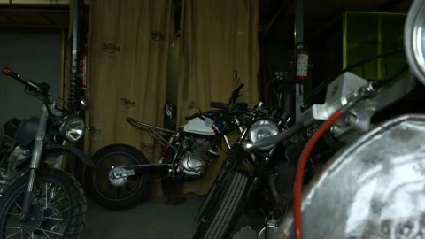 Motorcycles stand in the workshop Stock Footage 147554375