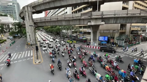 Motorcycles Traffic at intersection top view near Central World Shopping Plaza Stock Footage 172356026