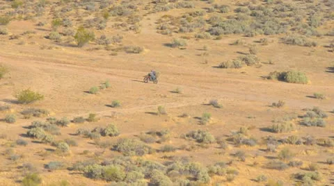 Motorcyclist in the desert Stock Footage 9535988