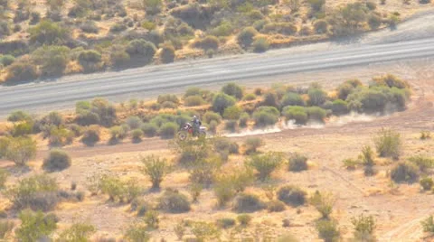 Motorcyclist in the desert Stock Footage 9536858