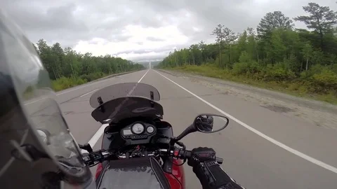 Motorcyclist driving on road Video stock 78226035