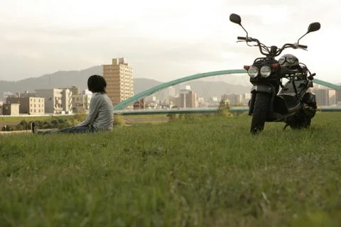 Motorcyclist in the field Stock Photos