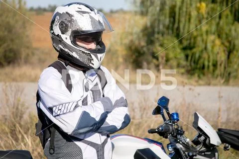 The motorcyclist in helmet on a motorcycle. Journey to a motorcycle Stock Photos