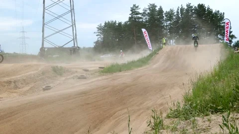Motorcyclists Jump off a Hill Stock Footage 199446445