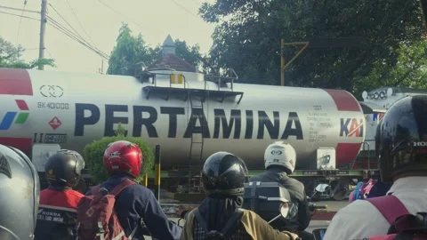 Motorcyclists lining up at a train crossing Stock Footage 241051323