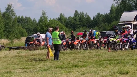 Motorcyclists on motorcycles are preparing for the start. Motocross Stock Footage 172178831