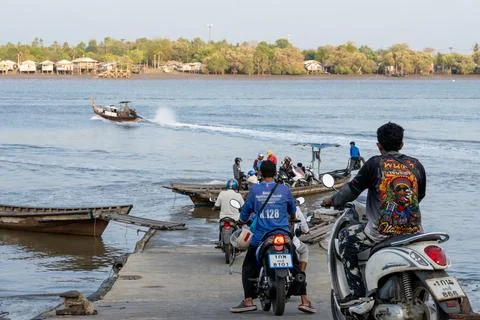 Motorcyclists Queue for a Ko Klang Ferry Stock Photos