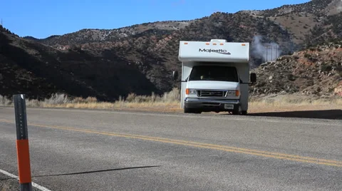 MOTORHOME PULLING OUT ONTO THE HIGHWAY Stock Footage 35731674