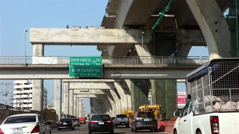 Motorists driving the Rama II road between Bangkok and Samut Sakhon Stock Footage 273662453