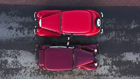Motorists make bets playing rock paper scissors. Top view, shooting from a Stock Footage 194471091