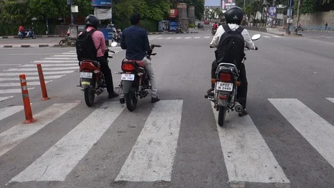 Motorists-stops-on-crosswalk-during-at-traffic-signal Stock Footage 94049586