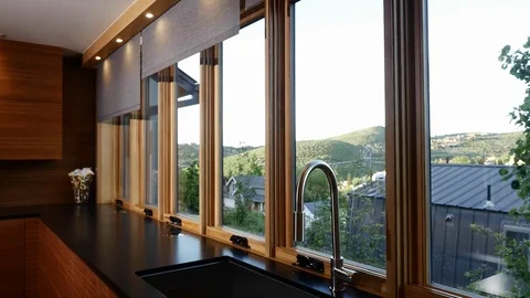 Motorized, automated interior window blinds close in contemporary home. Stock Footage 98014034