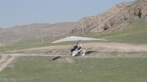 The motorized hang glider preparing for take-off Stock Footage 61753610
