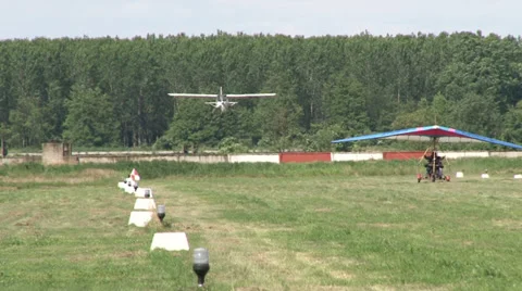 Motorized hang glider taking off Stock Footage 36773205