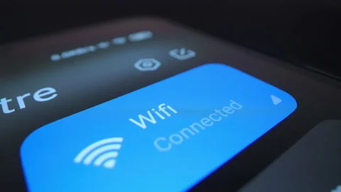 Motorized macro moving shot of connect smartphone to wifi Stock Footage 217416712