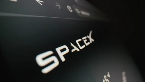 Motorized macro moving shot of SpaceX logo on its website Stock Footage 339763642