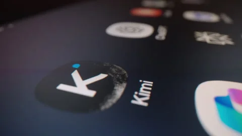 Motorized macro shot of Kimi AI app among popular AI assistants Stock Footage 340309256