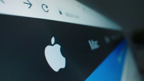 Motorized moving shot of Apple Inc. logo on its website Stock Footage 149026031