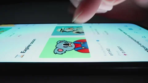 Motorized moving shot of browsing the NFT marketplace in Opensea app Stock Footage 159775870