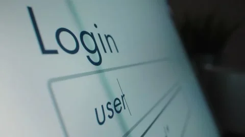 Motorized moving shot of entering username and password at login page Stock Footage