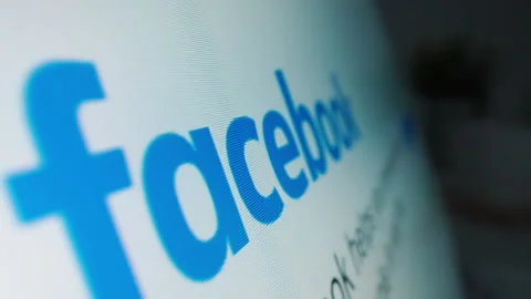 Motorized moving shot of Facebook logo on its website Stock Footage 148698563