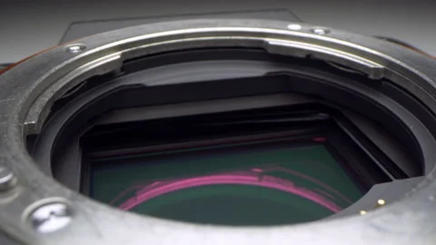 Motorized moving shot of the image sensor inside a mirrorless digital camera Stock Footage 136522809