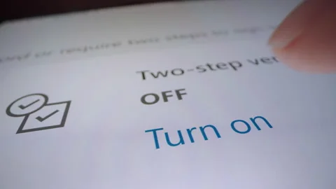Motorized moving shot of turning on two step authentication in Microsoft account Stock Footage 218066869