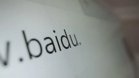 Motorized moving shot of typing Baidu URL in Internet browser Stock Footage 226061979