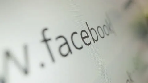 Motorized moving shot of typing Facebook URL in Internet browser Stock Footage 222456853