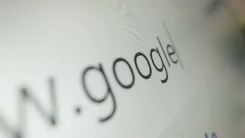 Motorized moving shot of typing Google URL in chrome browser Stock Footage 221881900