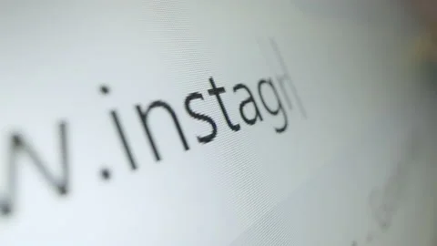 Motorized moving shot of typing Instagram URL in Internet browser Stock Footage 222690771