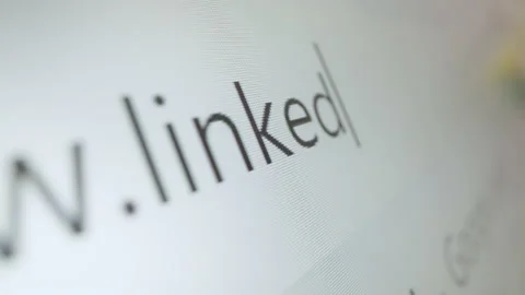 Motorized moving shot of typing Linkedin URL in Internet browser Stock Footage 222665140