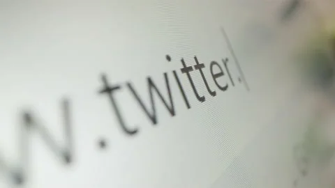 Motorized moving shot of typing Twitter URL in chrome browser Stock Footage 221960295