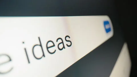 Motorized moving shot of using AI to brainstorm ideas with a text prompt Stock Footage 336525619