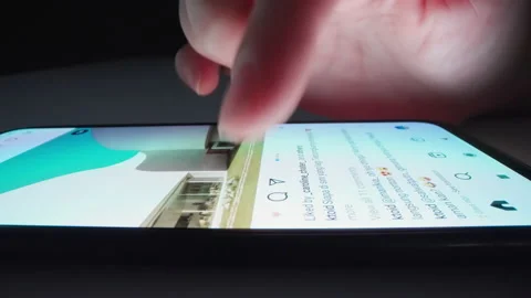 Motorized moving shot of using Instagram app in smartphone Stock Footage 157412643