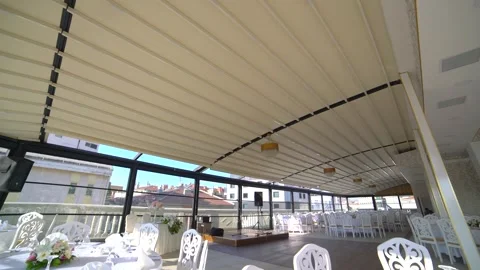 Motorized retractable roof sunshade opens automatically using remote control Stock Footage 340490943