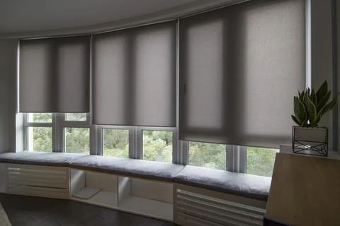 Motorized roller blinds in the interior. Foto stock