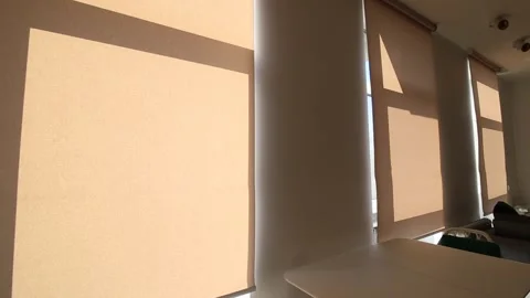 Motorized roller shades moving up. Stock Footage 284445597
