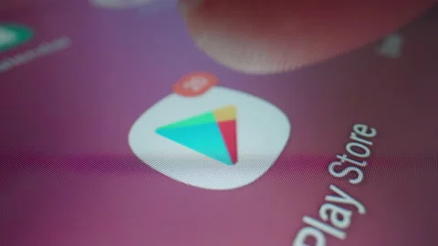 Motorized slow motion moving shot of clicking Google Play app icon in a tablet Video stock 196851693