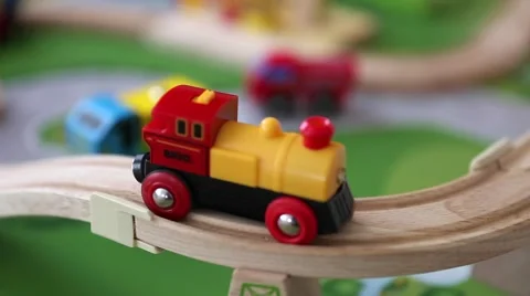 A motorized toy train on the track Stock Footage 45948980