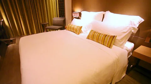 Motorized vertical dolly shot of a luxurious hotel room Video stock 36610013