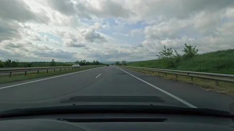 Motorway from the car window on a cloudy day Stock Footage 155105250