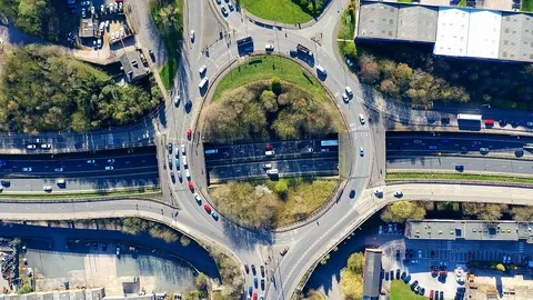 Motorway roundabout timelapse at rush hour, busy congestion Stock Footage 105510152