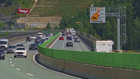 Motorway traffic on the highway on the border between Austria and Italy Stock Footage 161786664