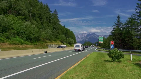 Motorway traffic on the highway on the border between Austria and Italy Video stock 161786944
