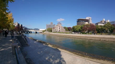 Motoyasu River passing the Atomic Bomb Dome in Hiroshima, Japan Stock-Footage 335545294