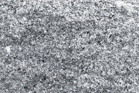 Mottled surface of granite. Stock Photos